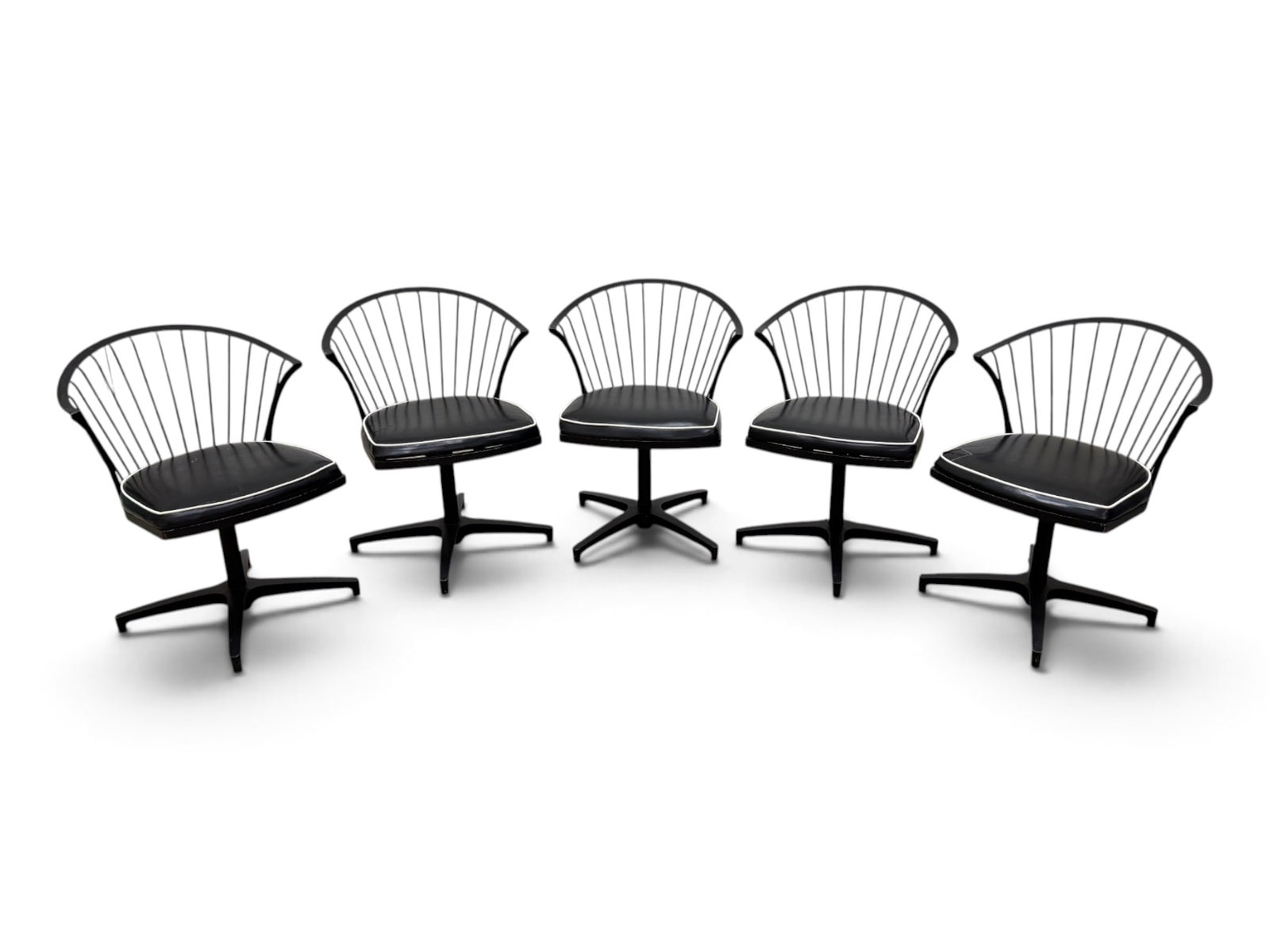 Russell Woodard Pinecrest Swivel Chairs: A set of 5 Rare Russell Woodard Pinecrest Wrought Iron & Vinyl Swivel Chairs. Marked on underside. Dimensions: H:28.75" W:22.75" D:23.5"Seat Height:"17.5