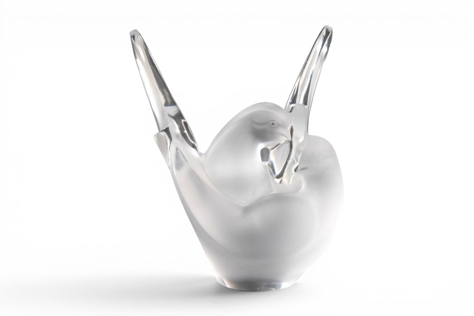 Lalique France Sylvie Crystal Vase: Signed Lalique France crystal Sylvie vase. Frosted glass birds, with glass flower frog. Signed Lalique France on the underside. Dimensions: H: 8.25" W: 6" D: 4"