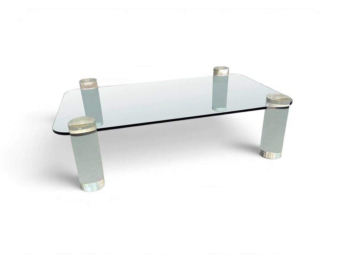 Karl Springer Style Lucite & Glass Coffee Table: Karl Springer style coffee / cocktail table. Glass top, 4 lucite legs. Dimensions including legs: H:18" W: 66" D:42.25" Floor to top of glass: 15 3/8" Glass Thickness: .75"