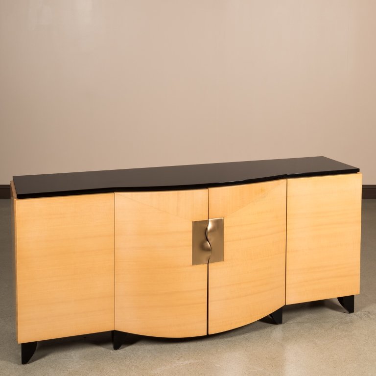 Lacquered Maple Credenza with Brass Handles: Lacquered maple credenza with brass handles. Maker: Unknown Age: Mid 20th Century Dimensions: 32" x 70" x 16" All furniture dimensions are Height x Width x Depth