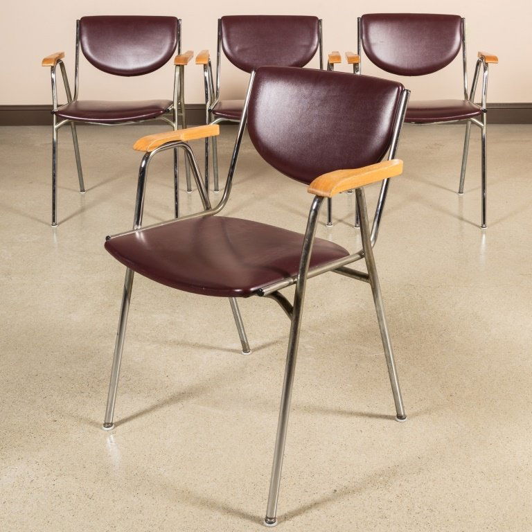 Group of Four Thonet Chrome and Leather Chairs: Group of four signed Thonet chrome and leather chairs with sculpted arm rests. Maker: Thonet Age: Mid 20th Century Dimensions: 31" x 23" x 18" All furniture dimensions are Height x Width x Depth