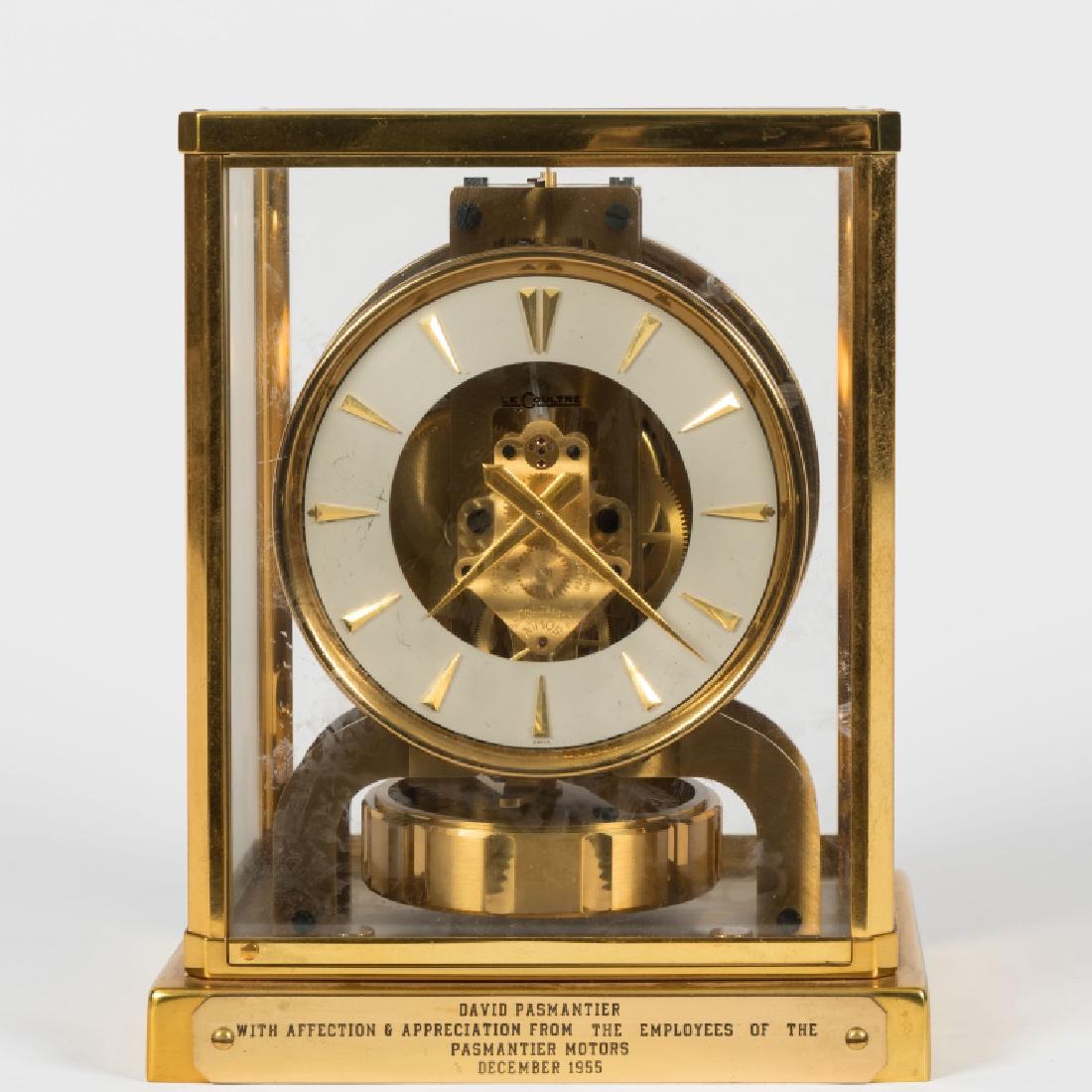 Jaeger LeCoultre 15 Jewel Atmos Clock: Description: Jaeger LeCoultre fifteen-jewel Atmos clock. With name plate attached to front.