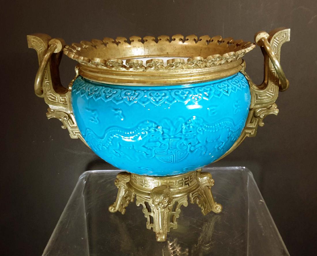 French Japonisme Porcelain & Bronze Center Bowl Vase: French Japonisme Porcelain & Bronze Center Bowl Vase. Circa 1880.Great qualiy Bronze casting and fine quality porcelain in style of Theodore Deck . Approx. Measurements: 15" Wide. 11" High