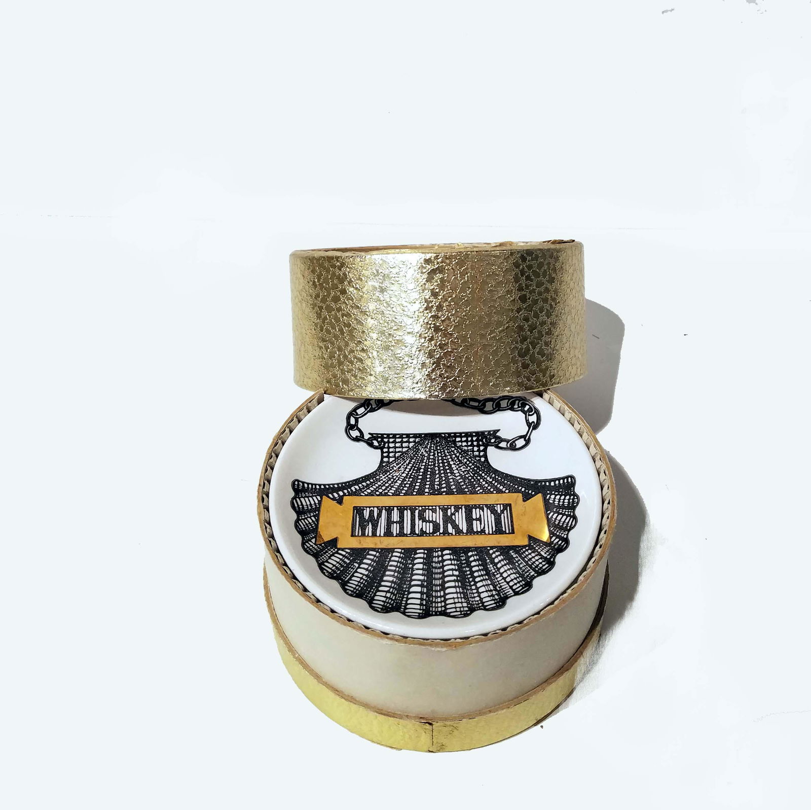 Set 8 of Piero Fornasetti Wine and Liquor Ceramic Coasters, Vini E Liquori: Set 8 of Piero Fornasetti Wine and Liquor Ceramic Coasters, Vini E Liquori. Set of Piero Fornasetti wine and liquor ceramic coasters,Vini E Liquori,1950s. 4" in diameter.