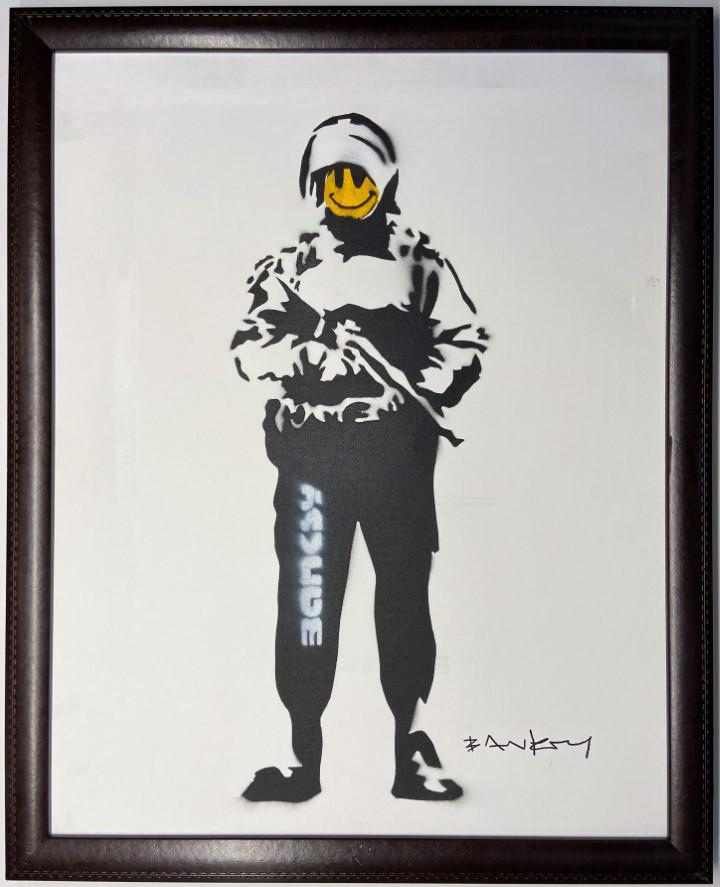 Banksy Spray paint on canvas: Private Collection 22" x 28" Banksy is an anonymous England-based graffiti artist, political activist and film director of unverified identity. Their satirical street art and subversive epigrams combi