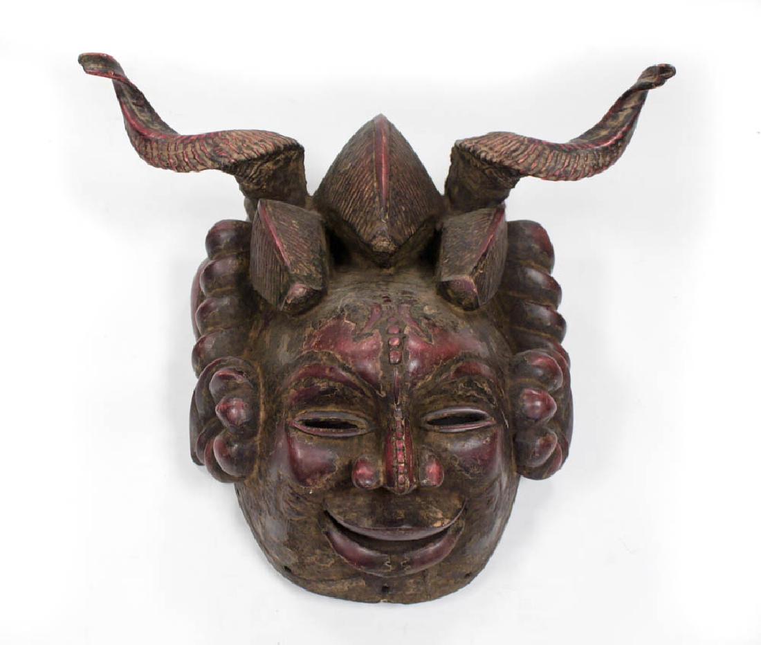 A Carved Ethnic Wood Mask (1 of 5)