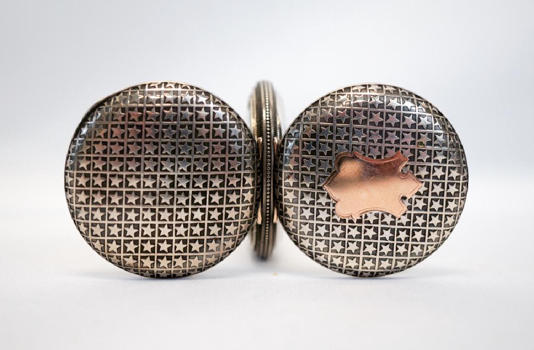 American Waltham Enamel Pocket watch w/ Stars: An unusual American Waltham pocket watch with enamel movement and stars throughout case in a niello style. Stars on both sides, size 6, not running. The crystal is cracked and the back will not stay c