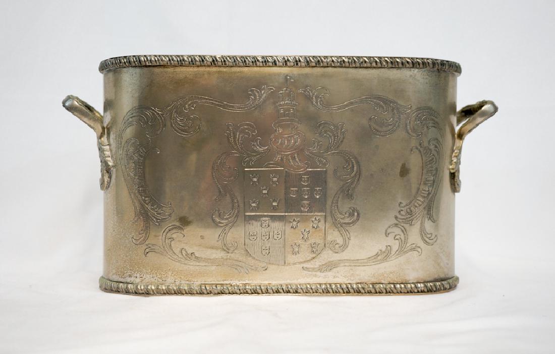Silverplate Double Wine Cooler: English silverplate double wine cooler, with removable ice screens. Approximately 13x7x4 inches. We ship most items in house. Exclusions include furniture, oversized framed artwork and heavier items. 
