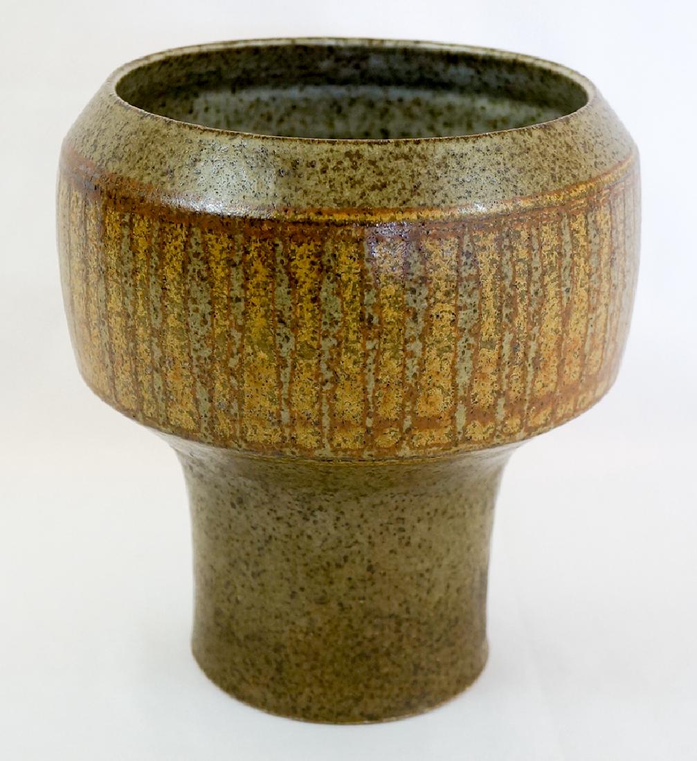 Robert Maxwell Studio Pottery: Robert Maxwell studio pottery vase. Excellent condition with a very tiny nick on base edge measuring 1/8". No other cracks, chips or repairs. Measures 8" x 7". We ship most items in house. Exceptions