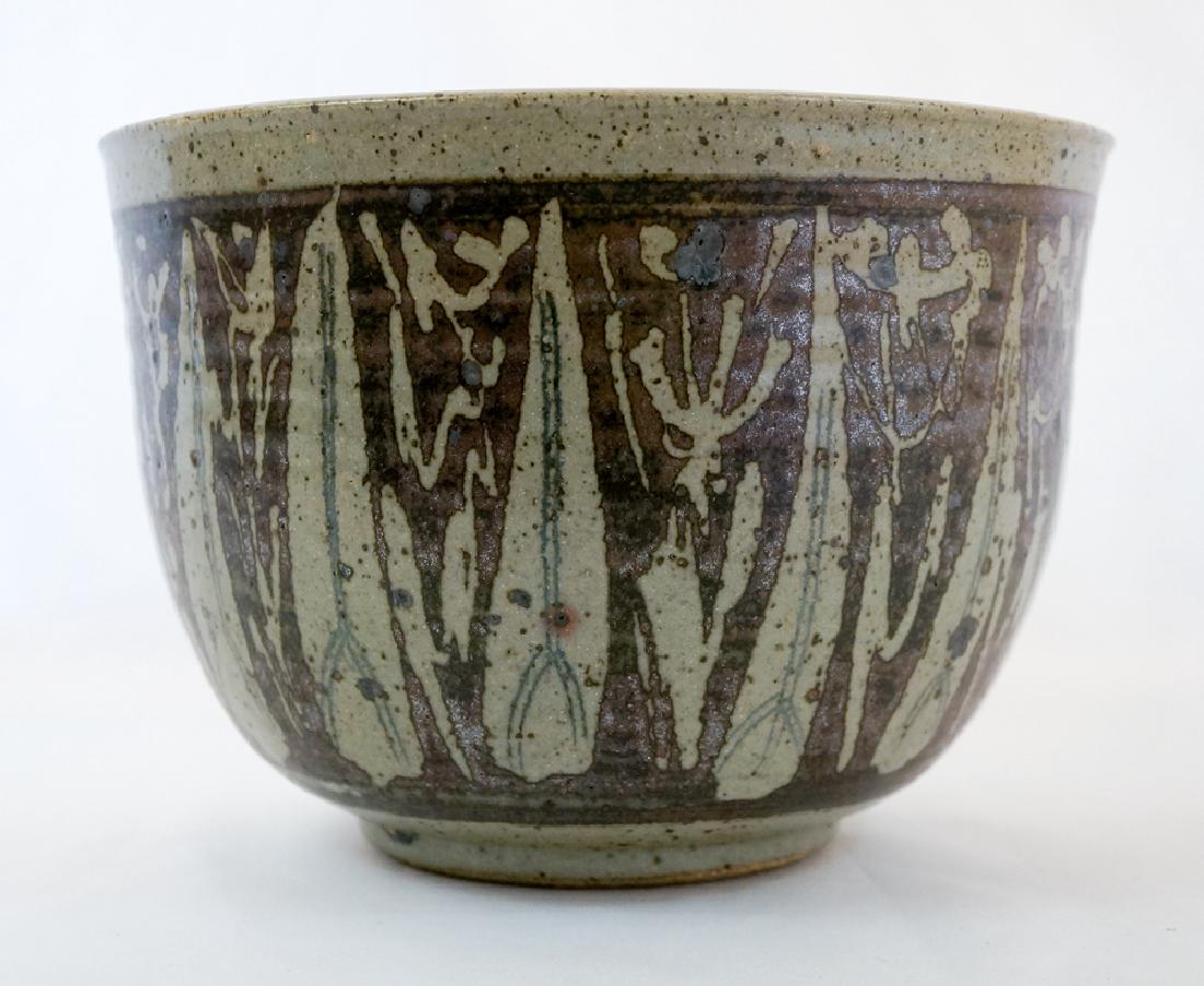 James and Nan McKinnell Studio Pottery Planter: James and Nan McKinnell studio pottery planter. Excellent condition with no cracks, chips or repairs. Measures 8.25" x 5.75". We ship most items in house. Exceptions include furniture, large art, some