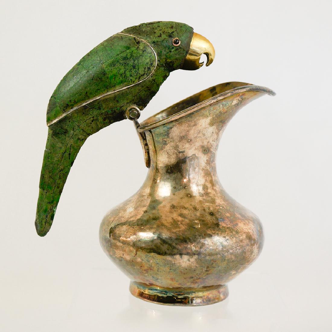 Los Castillo Bird Pitcher: Los Castillo silver plate bird pitcher. Measures 7" tall and is in excellent condition We ship most items in house. Exceptions include furniture, large art, some medium and larger ceramics. Please inq