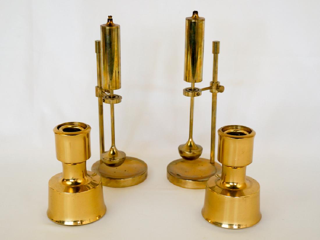 Dansk IHQ and Ilse D. Ammonsen Mid-Century Items: A group of mid-century modern brass items. The candleholders are Dansk IHQ and measure 4.5" x 3". The lanterns are signed Ilse D. Ammonsen and measures 9.25" x 3.25". They all show light-to-medium use
