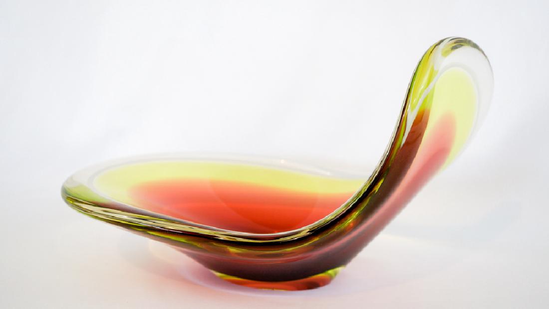 Paul Kedelv Flygsfors Coquille Glass Bowl, Large: Paul Kedelv Flygsfors Coquille Glass. Measures 6.25" x 11.5" x 7" (16 cm x 29 cm x 18 cm). This piece has one small chip lower side edge center rim. There are no other scratches or damage to report. W