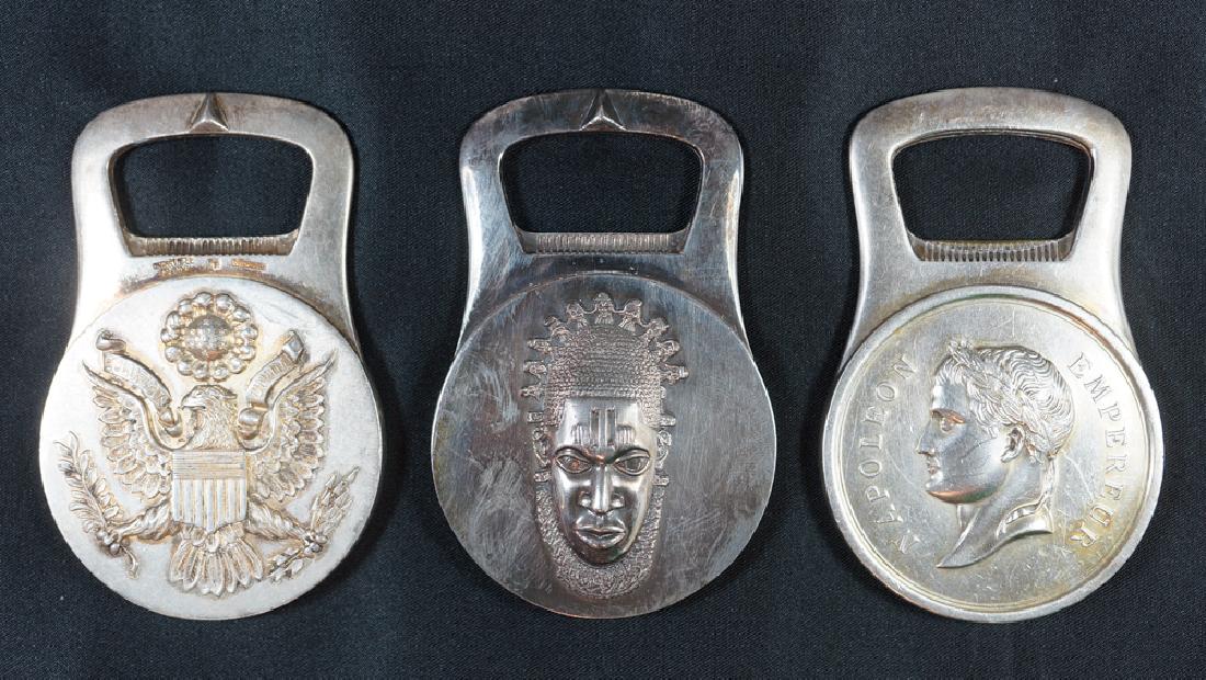 Christofle Gallia Bottle Openers, Three: Christofle Coll. Gallia bottle openers, three. They measure 8 cm x 5 cm (3" x 2") and all are in very good to excellent condition. We ship most items in house. Exclusions include furniture, oversized