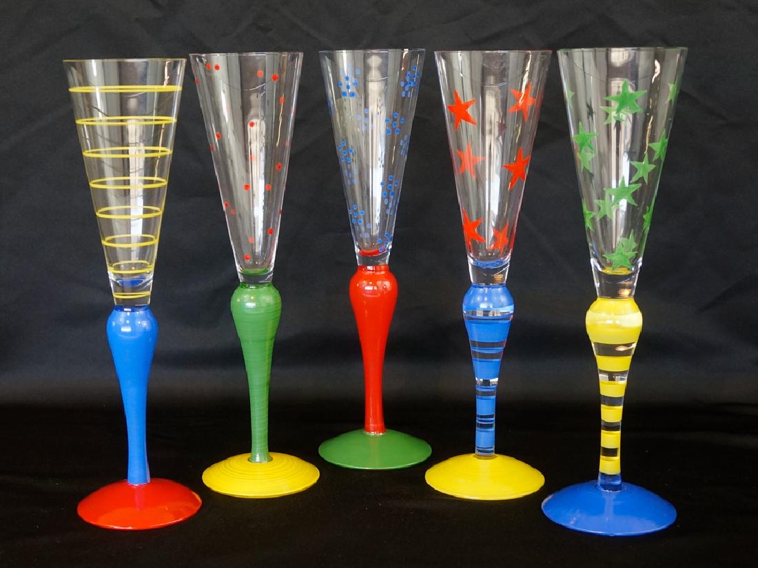 Anne Nilsson for Orrefors Clown Champagne Glasses: A group of five Orrefors Sweden Clown Champagne glass designed by Anne Nilsson. All are in excellent condition with no cracks, chips or damage. Measuring 10.5" tall (26.5cm). The glass is signed AN CL