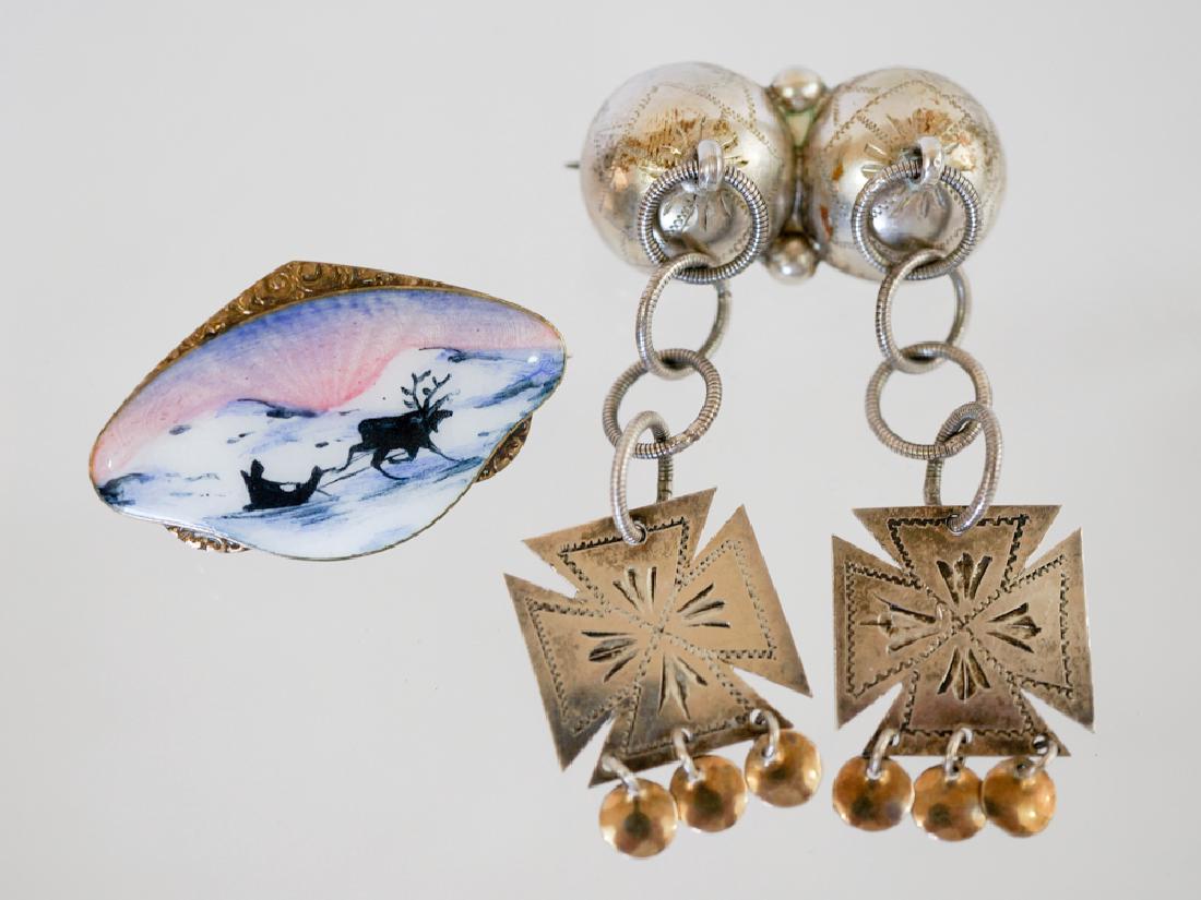Scandinavian Sterling ans Enamel Pin and Solje: A fine Scandinavian enamel pin marked 925S measuring 1.5" x 1" in excellent condition. Lot also includes a Solje silver pin marked 830S measuring 2.5" x 1.25. We ship most items in house. Exclusions i