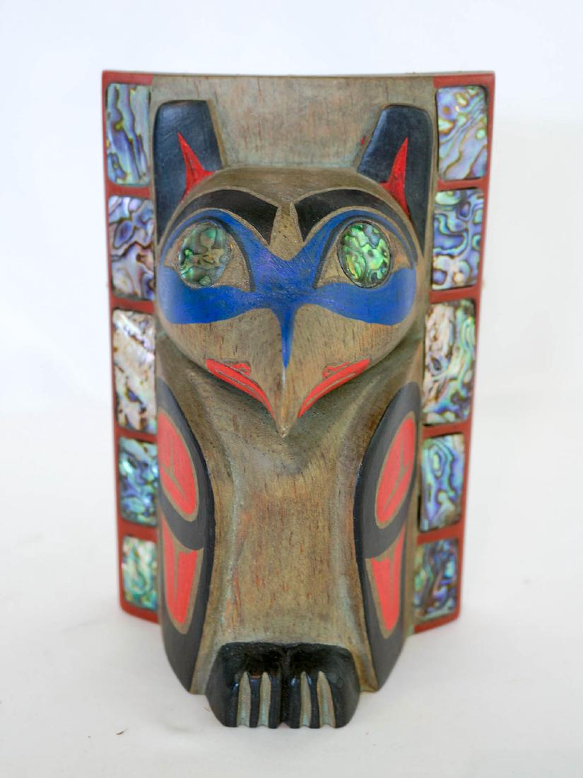 Panniniak Signed Unuit Fronlet: An Inuit frontlet signed Panniniak. Measures 7" x 4.5" x 3.75." (18 cm x 11.5 cm x 9.5 cm). No feathers, otherwise excellent condition. We ship most items in house. Exclusions include furniture, overs
