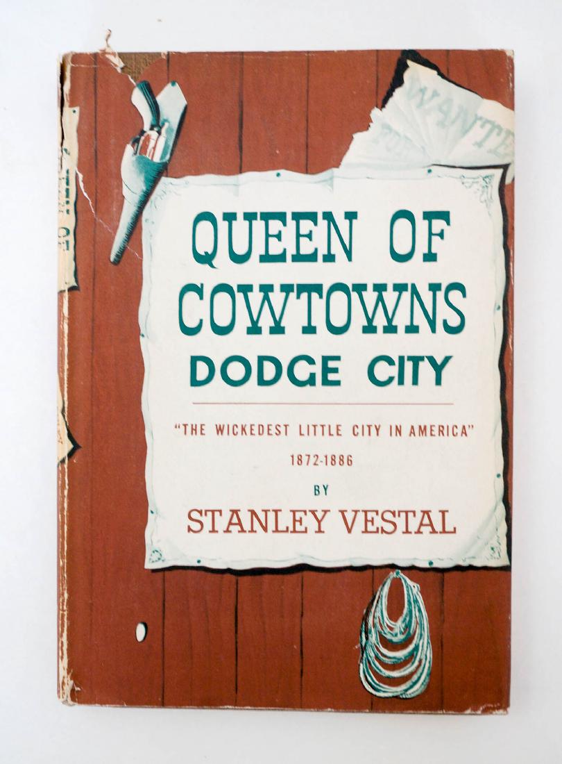 Queen of Cowtowns Dodge City: Queen of Cowtowns Dodge City by Stanley Vestal. Dodge City. 1st Ed. Harper & Brothers 1952. With original DJ. Book in Excellent condition. Provenance: Private collection, Davenport, WA. We gladly comb