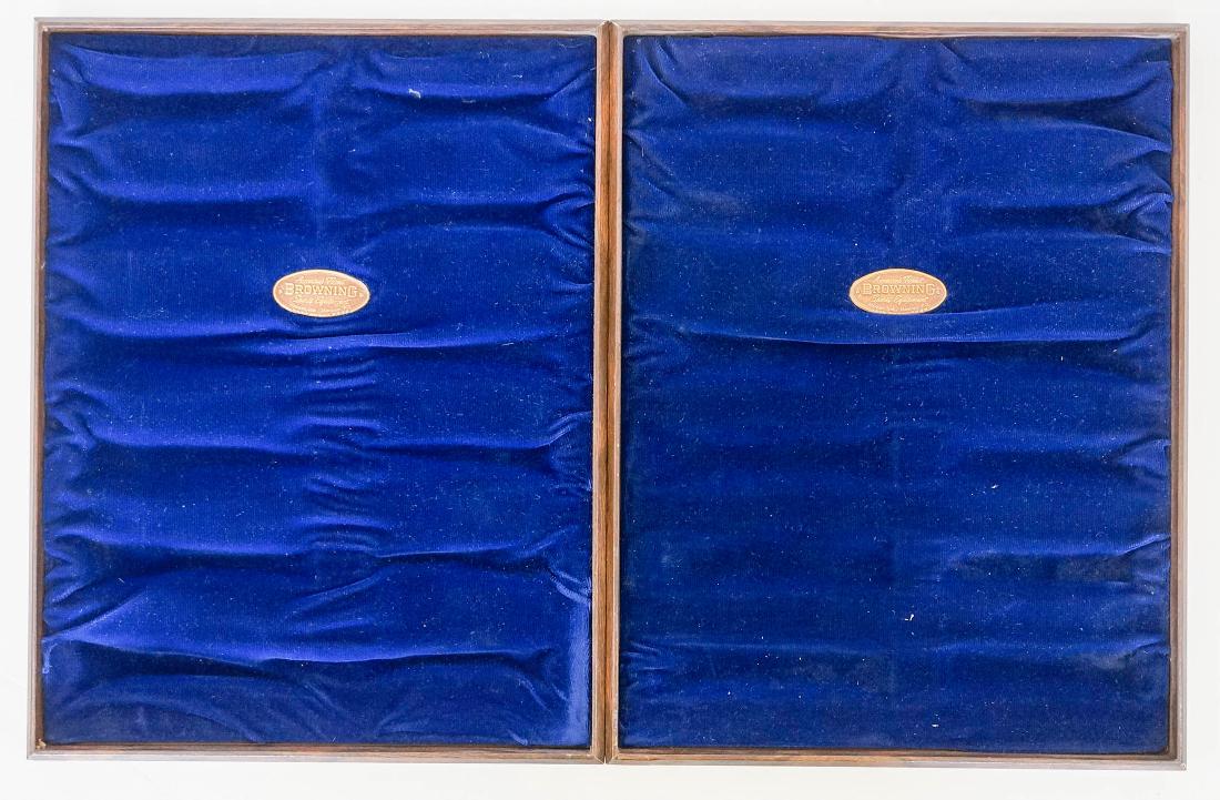 Pair of Browning Knives Store Display Trays: Two Browning knives store display trays. Each displays twelve Browning folding knives and measure 15.5" x 12". Excellent condition. Provenance: Estate of Earl E. Buchanan, Gunsmith, Kooskia, ID. We sh