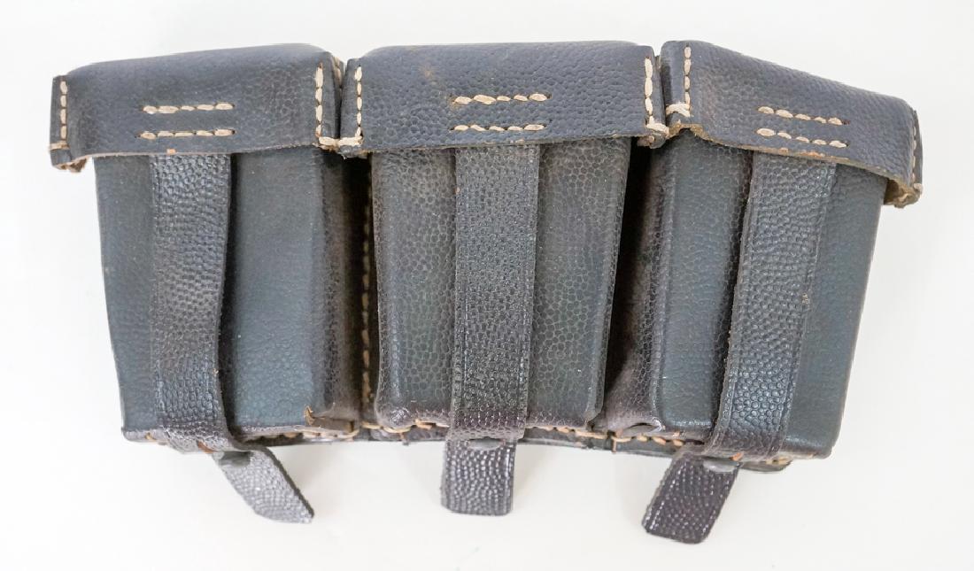 German WWII 98k Mauser Black Leather Pouch: German WWII 98k Mauser Black Leather Triple Ammunition Pouch. We ship most items in-house with the exception of firearms, large and/or heavy items and any other items/s that say special shipping requi