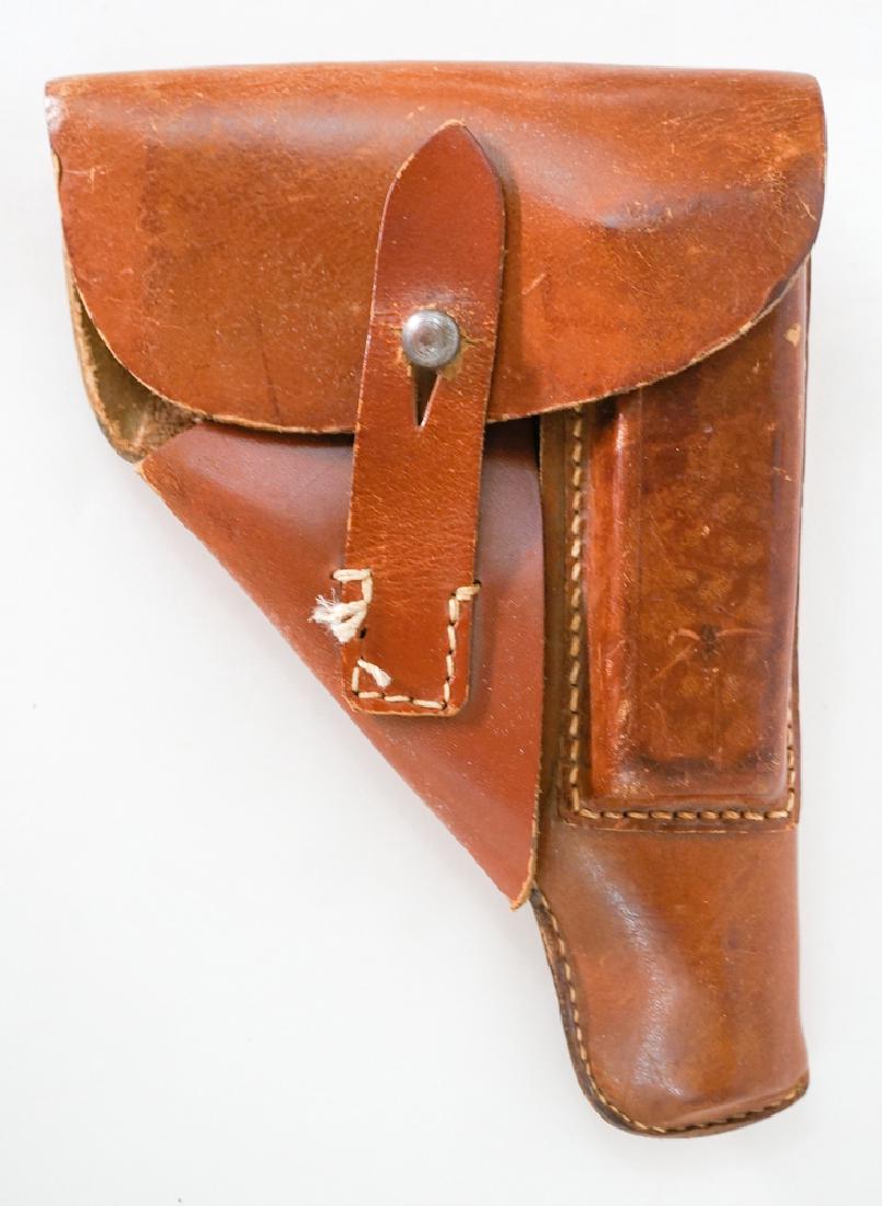Vintage P38 Holster: A nice vintage P38 leather holster. European flap style, pocket pistol holder with magazine pouch. Unmarked, very good. Provenance: Estate of Earl E. Buchanan, Gunsmith, Kooskia, ID. We ship most item
