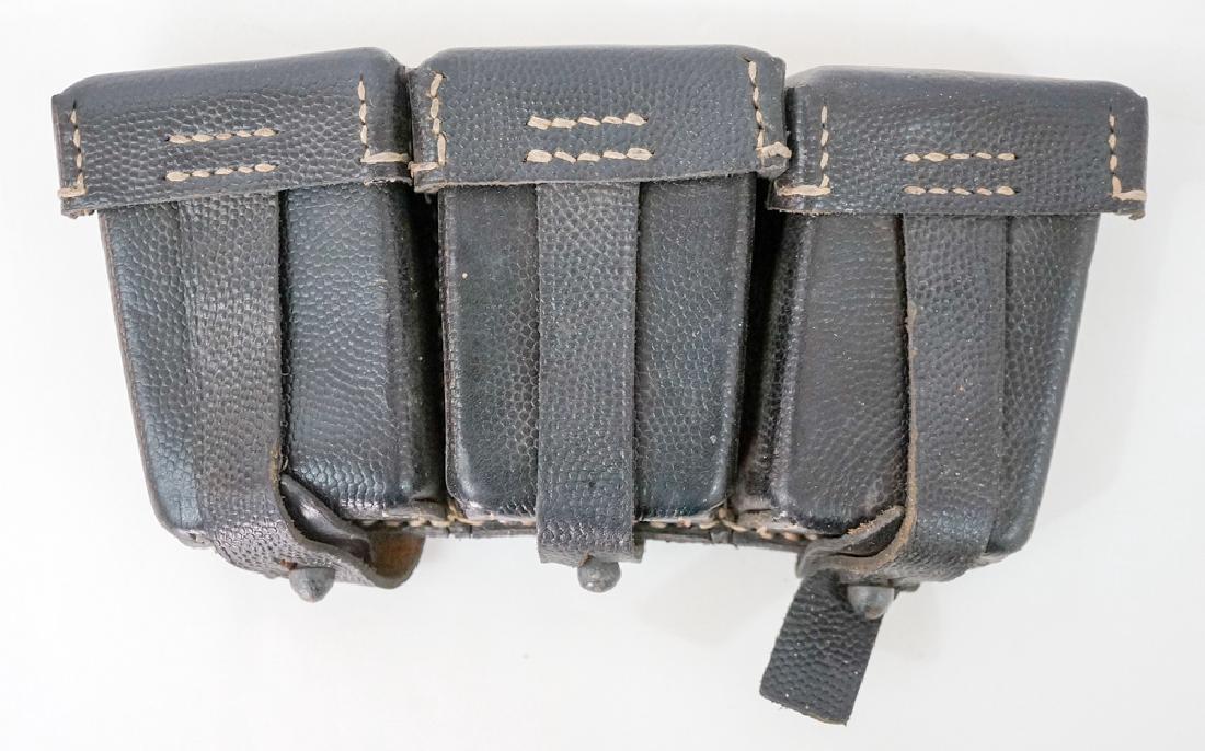 WWII German Black Mauser 98k Ammo Pouch: WWII German Black Mauser 98k Ammo Pouch. Excellent. Provenance: Estate of Earl E. Buchanan, Gunsmith, Kooskia, ID. We ship most items in-house with the exception of firearms, large and/or heavy items 