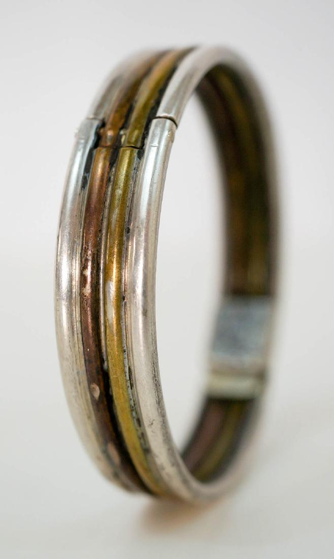 Los Castillo Mixed Metal Bangle: Los Castillo mixed metal bangle bracelet. Measures .5" width and about 7" inside circumference. Weighs 59 grams total. We ship most items in-house with the exception of firearms, large and/or heavy it