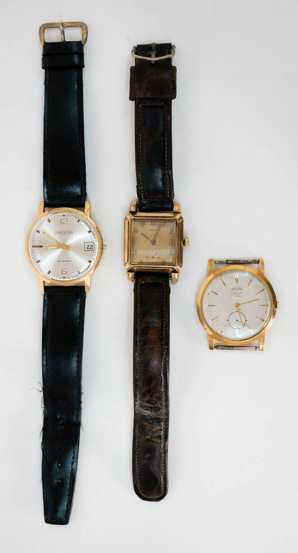 Three Vintage Men's Wrist Watches: Three vintage men's wrist watches. Includes Longines Tank wrist watch, Enicar Ultrasonic 17 Jewels and Dec Cartes Automatic. Only the Des Cartes is working, however, it is missing the stem. We ship mo