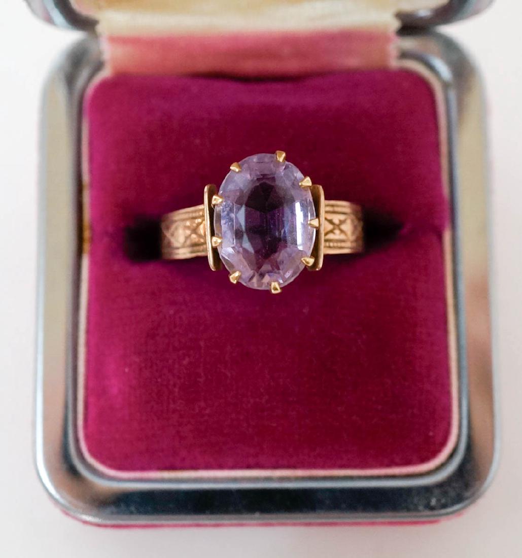 Antique 10k Gold Ring with Pink Stone: An antique 10k gold ring with pink stone. Weighs 2.4 grams, ring size 8 and the stone measures 12 mm x 9 mm. We ship most items in-house with the exception of firearms, large and/or heavy items and an