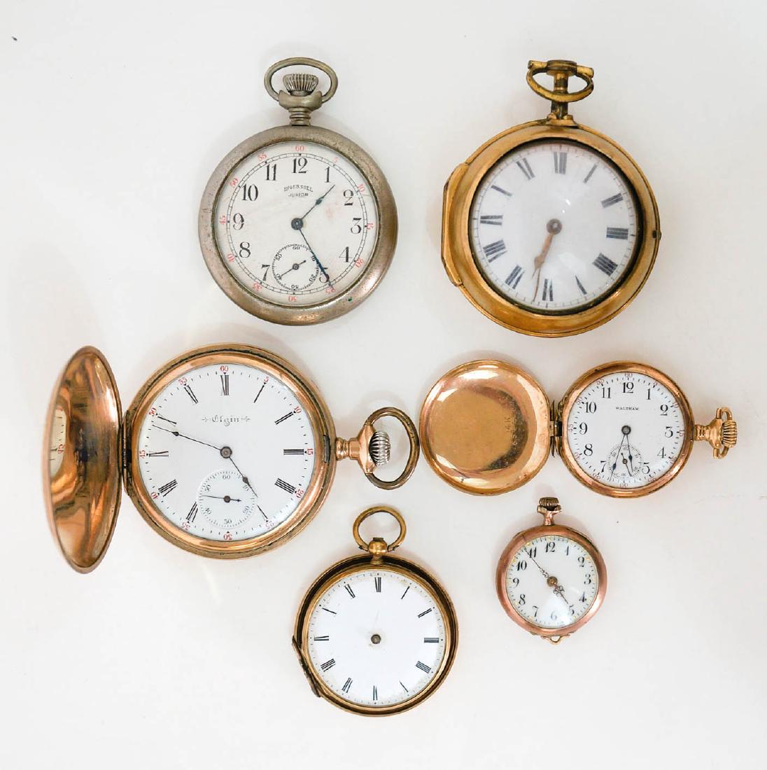 A Group of Six Antique Watches For Parts or Repair: An estate lot of vintage and antique pocket watches for parts or repair. One 14k and one 18k (the second and third smallest). We ship most items in-house with the exception of firearms, large and/or h