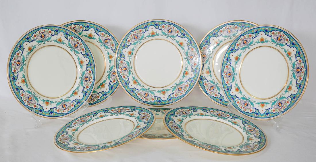 Eight Floral Mintons Plates H2922: A set of eight Mintons dinner or service plates measuring 10.25". Appear to be used only a couple of times. Very few light knife scratches and only a few tiny nicks on feet. We ship most items in-hous