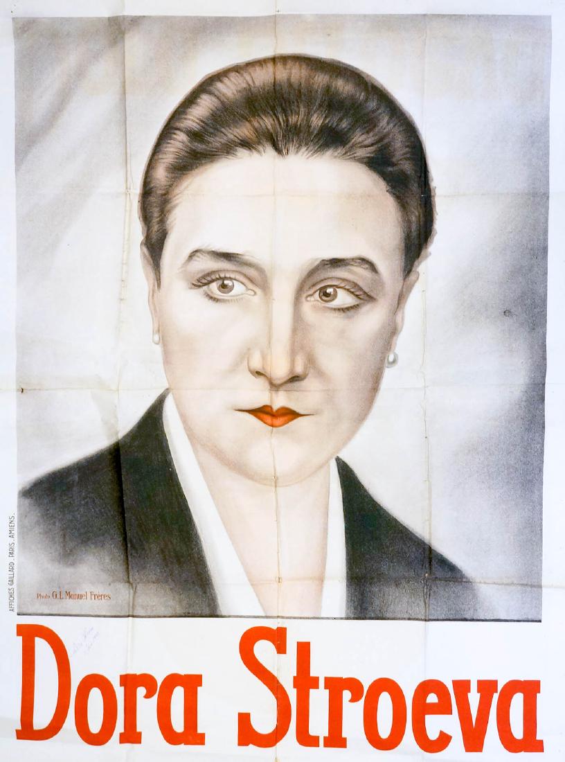 G.L. Manuel Freres Dora Stroeva Signed Poster: Estate find-G.L. Mauel Freres poster of Dora Stroeva, signed in pen Stroeva. Measures 62.5" x 47" (159 cm x 119.5 cm). Fair condition with creases, tears and some paper loss. Unframed, loose and not m