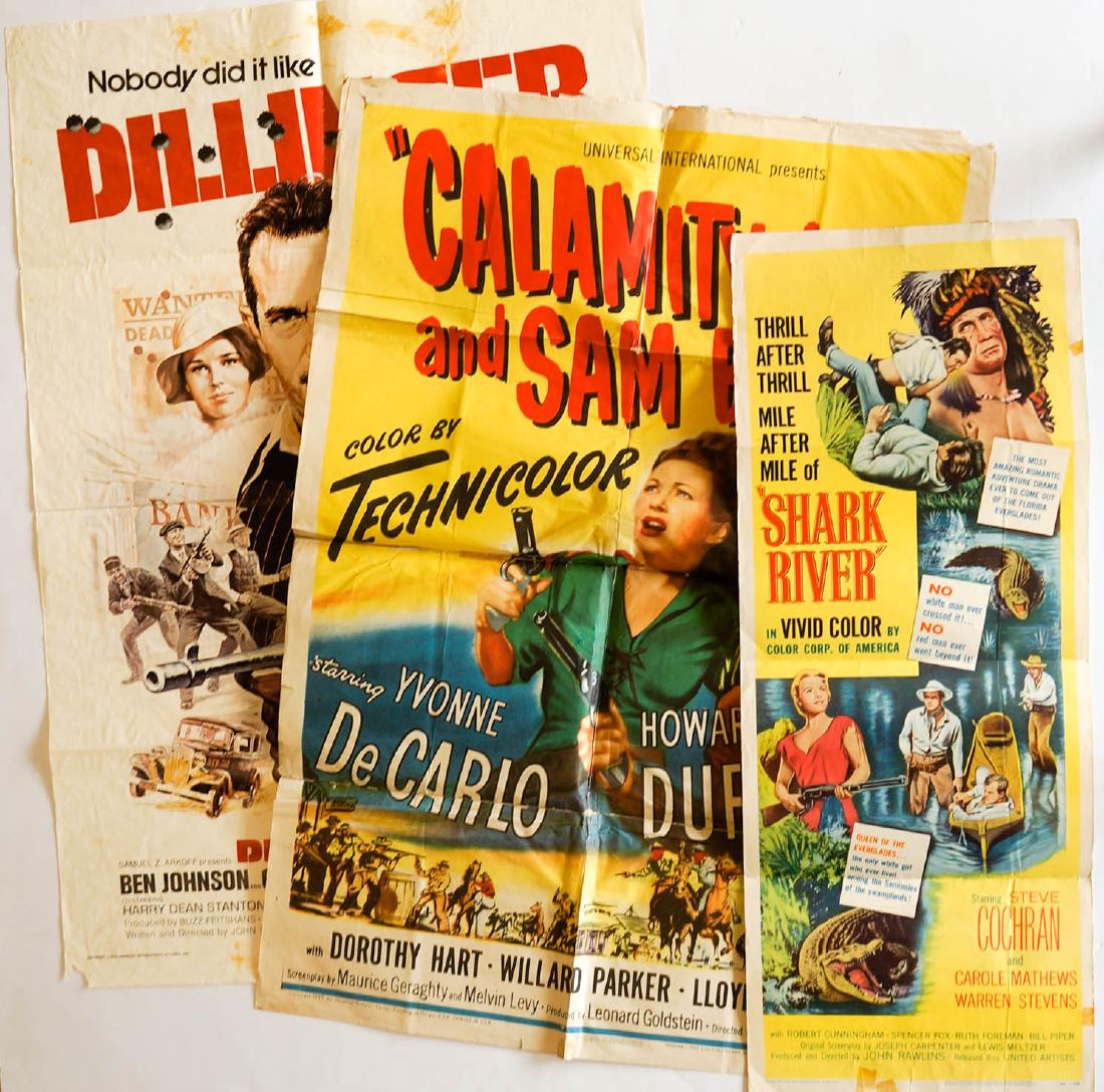 Three Movie Posters: Three vintage movie posters. 1. Shark River starring Steve Cochran, Carole Mathews & Warren Stevens. 2. Calamity Jane and Sam Bass starring Yvonne DeCarlo and Howard Duet - pieced together and taped o