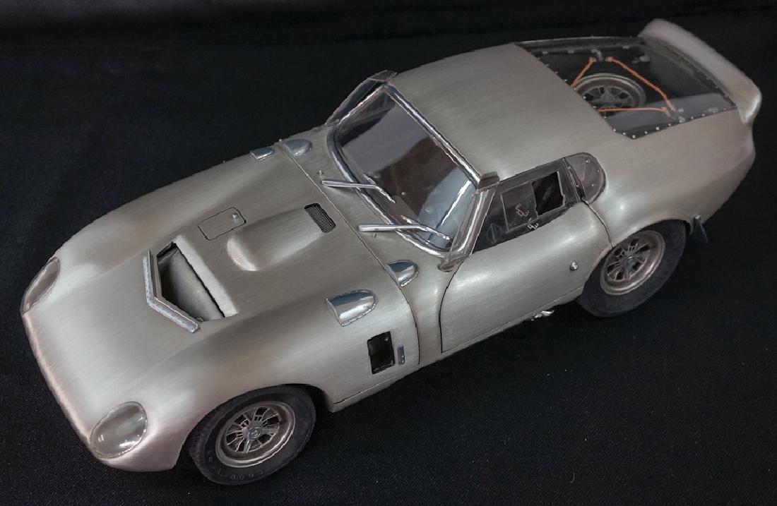 Shelby Daytona Coupe Pewter Limited Edition: Franklin Mint Limited Edition Shelby Daytona Coupe In Fine Pewter. Measures 13.5" in length, MIB, mint in box. In fitted case as issued. We ship most items in-house with the exception of firearms, lar