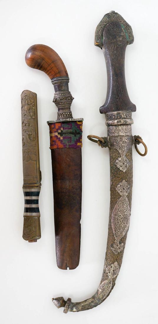 Persian, Arabic and Islamic Daggers Jambiya Kanjar: Three Persian, Arabic or Islamic daggers. Measure 7 7/8" total length to 16" total length. We ship most items in-house with the exception of firearms, large and/or heavy items and any other items/s th