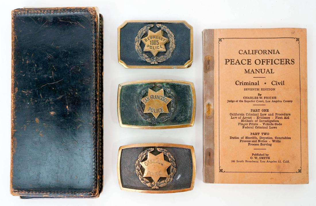 Group of Vintage California Police Memorabilia: Group of California Police collectibles. Includes three belt buckles, Berkeley ticket book and California Peace Officers Manual. We ship most items in-house with the exception of firearms, large and/o