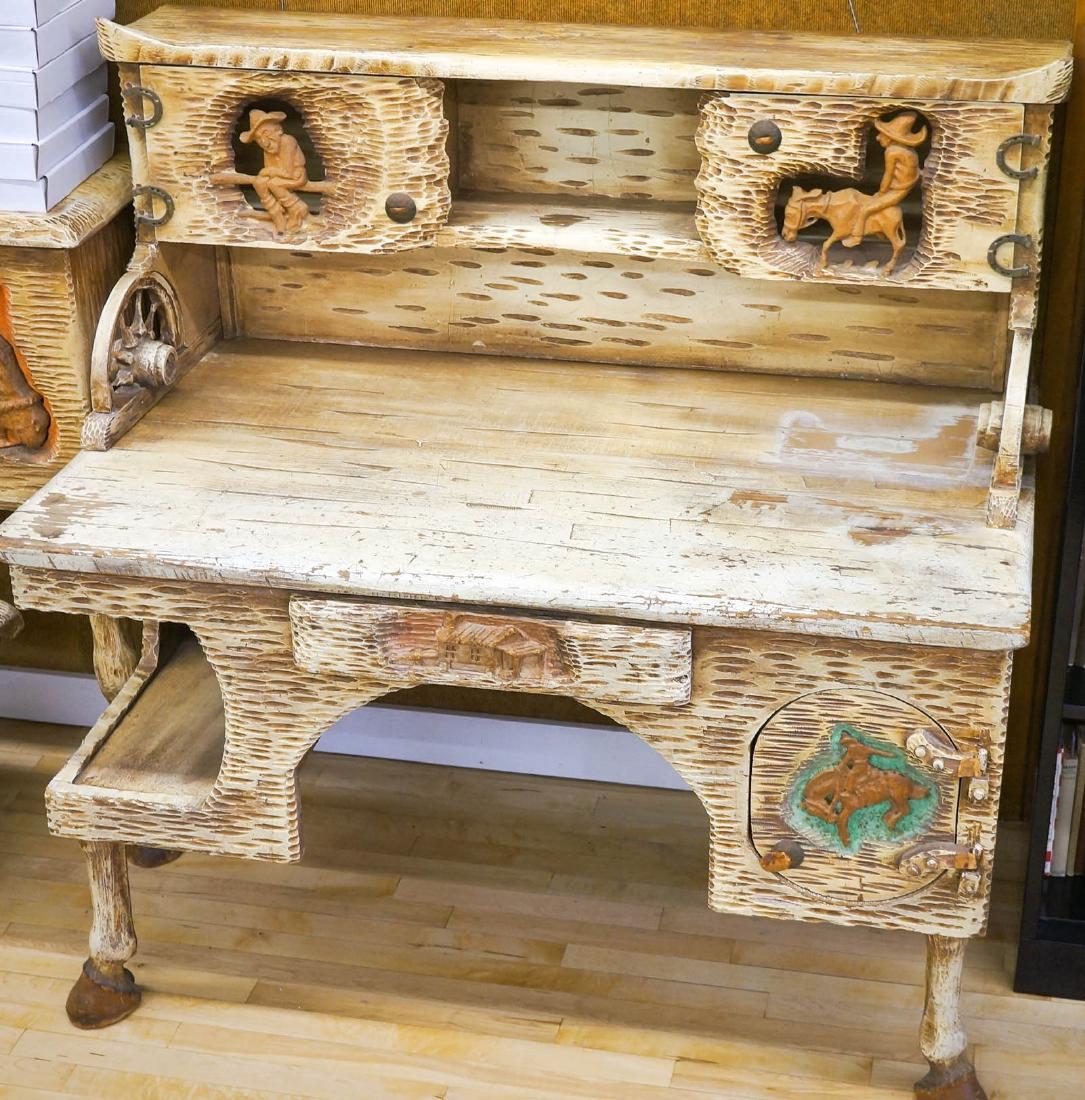 Dr. Harley Niblack, (1894-1996) Carved Desk: Dr. Harley Niblack, (1894-1966) carved desk. Measures 52 1/4" x 30 3/4" x 51 1/2".Right door needs new leather straps to hold secure. Provenance: Private collection Bellingham, Wa. Special shipping ar