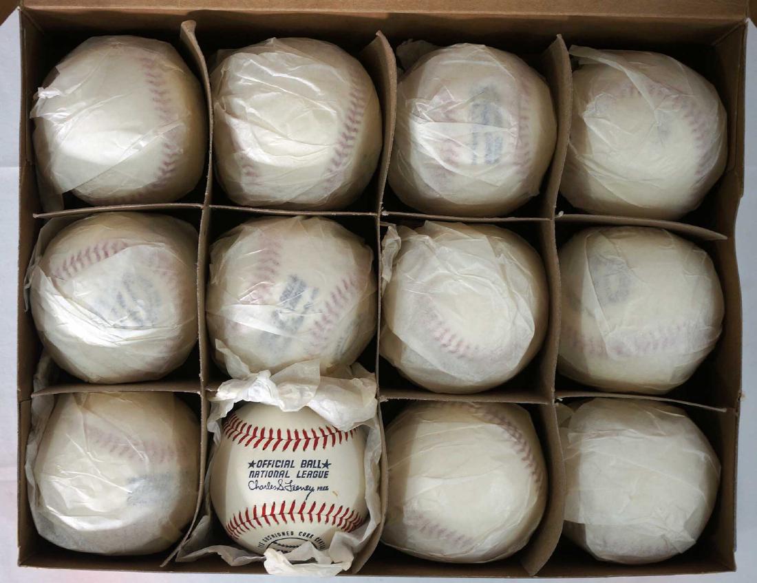 Vintage Spalding Official National League Balls: Vintage Spalding Official National League baseballs. A dozen all mint in box. Charles Feeney commissioner. All twelve baseballs Mint in Box, box itself in very good to excellent condition. Great baseb