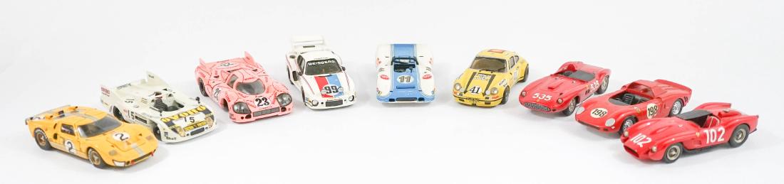 Group of Nine 1:43 Scale High-End Model Cars: A group of nine high-end 1:43 scale model cars. Some retain original price stickers showing purchase prices over $100 each. We ship most items in-house with the exception of furniture, large or heavy 