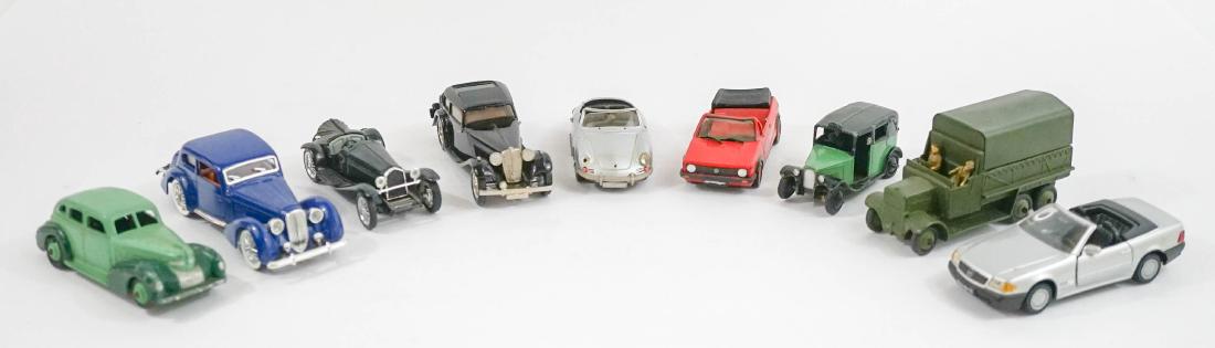 Group of eight 1:43 Scale Model Cars: A group of eight 1:43 scale model cars. We ship most items in-house with the exception of furniture, large or heavy artwork, heavier items or extremely fragile items.