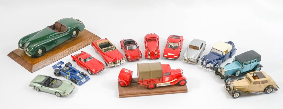 Group of Model Cars: Group of mostly 1:43 scale model cars. Many high-end makers. From the collection of Alan Rypinski. We ship most items in house. Exclusions include furniture, oversized framed artwork and heavier items