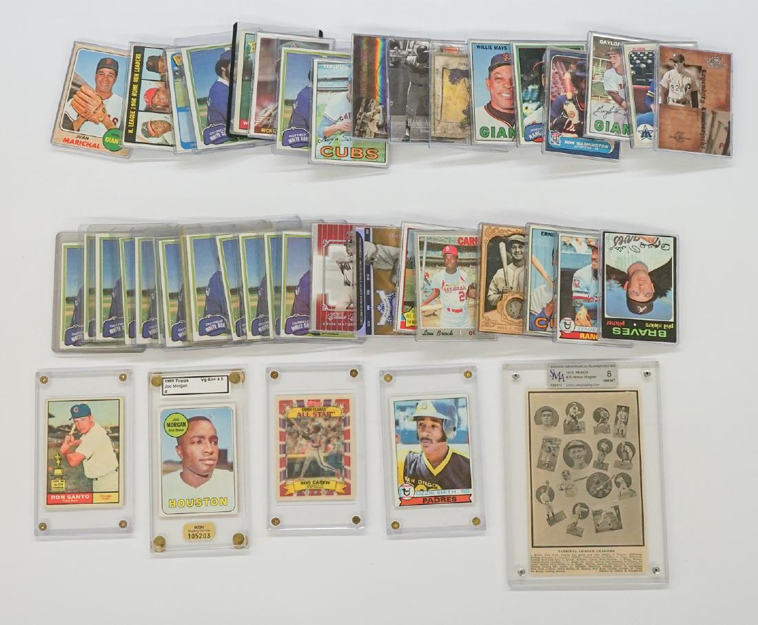 A Group of [58] Vintage Baseball Cards: A group of [58] graded baseball cards. Includes rookie cards, Hall of Famer's, stars and more. Willie Mays, Ernie Banks, Joe Morgan and more. We ship all items from this auction in house.