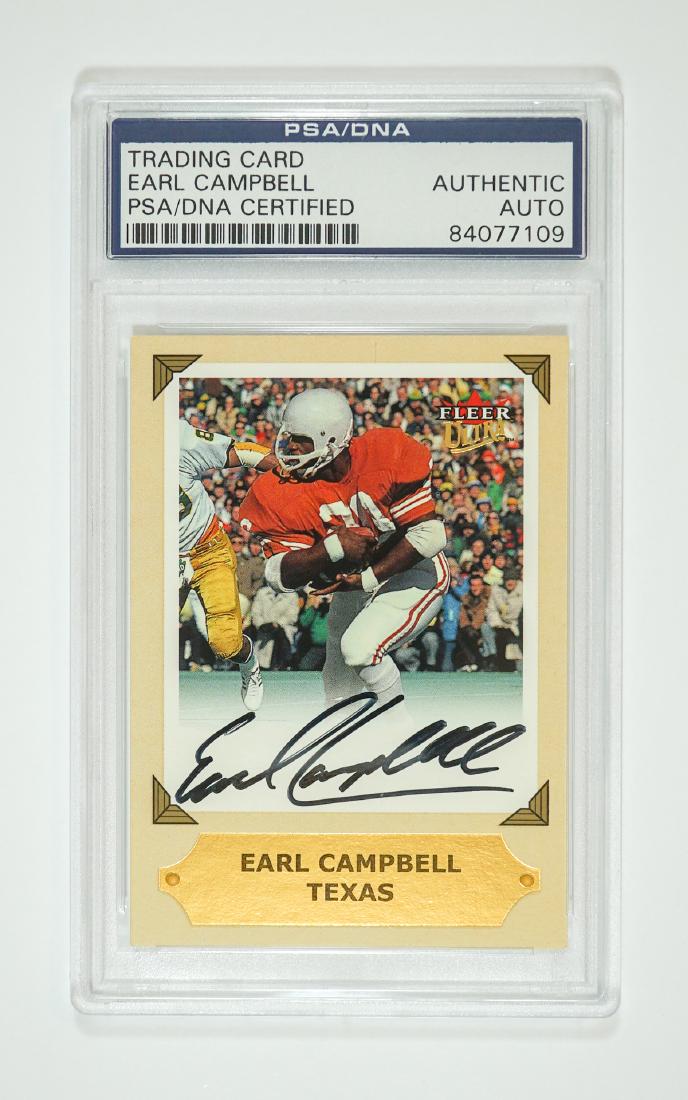 Earl Campbell Autographed Football Card PSA/DNA: Earl Campbell autographed football card. PSA/DNA authenticated and encapsulated. All items in this auction from Lot 300 to the last lot start with an opening bid of $10. We ship all items from this au