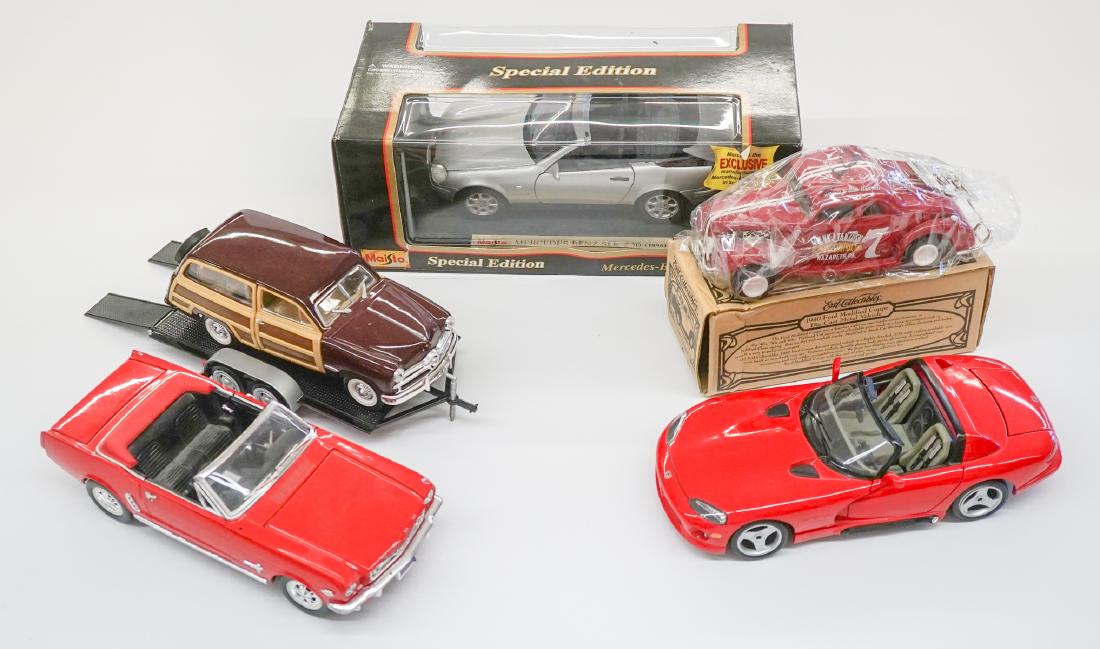 Group of Scale Model Cars: Group of scale model cars. We ship all items from this auction in-house and gladly combine shipping.