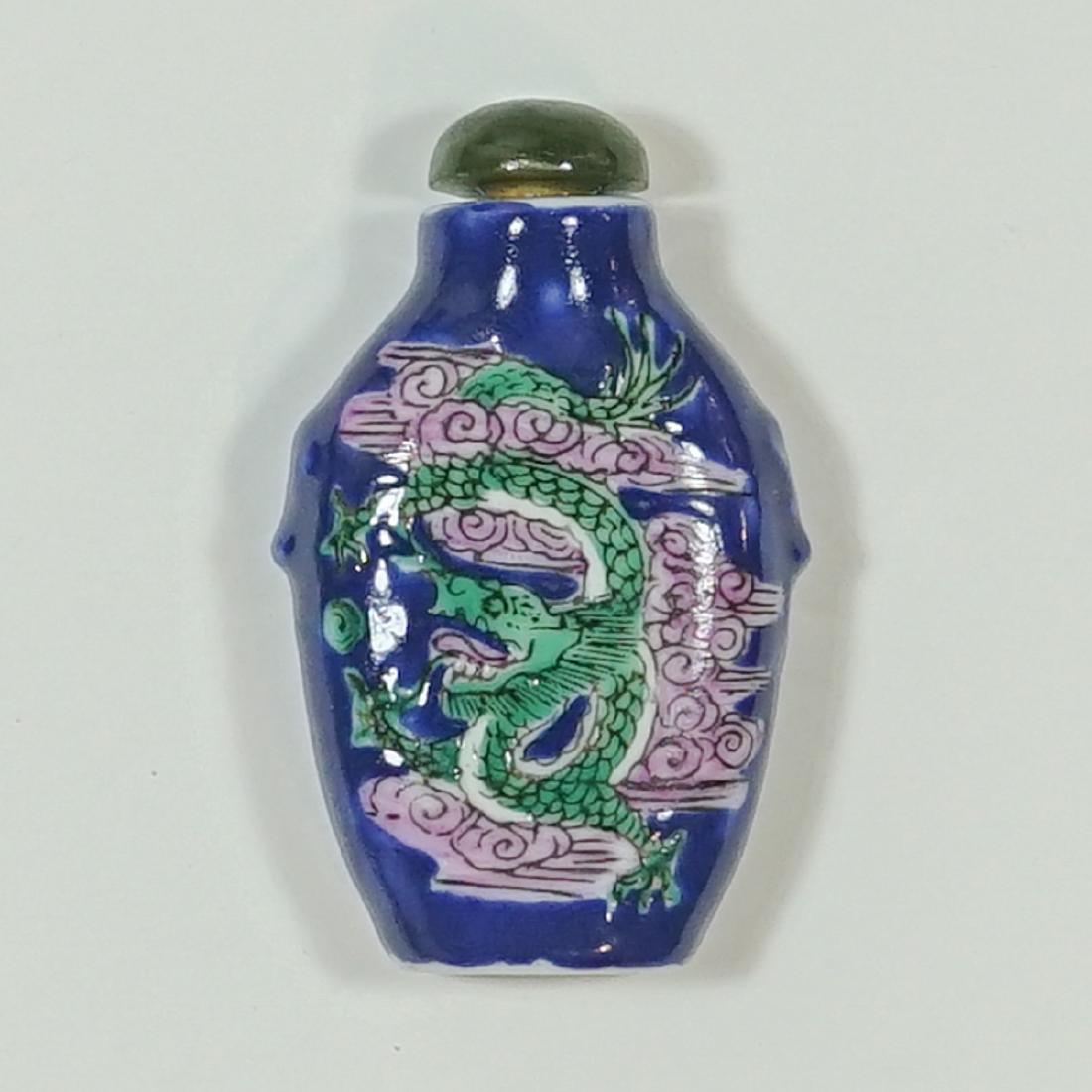 Old Chinese Fine Porcelain Signed Snuff Bottle: Old Chinese fine porcelain signed snuff bottle. Measures 2 5/8" x 1 5/8". Excellent condition with a piece of old scotch tape adhered. We ship most items from this auction in house and gladly combine