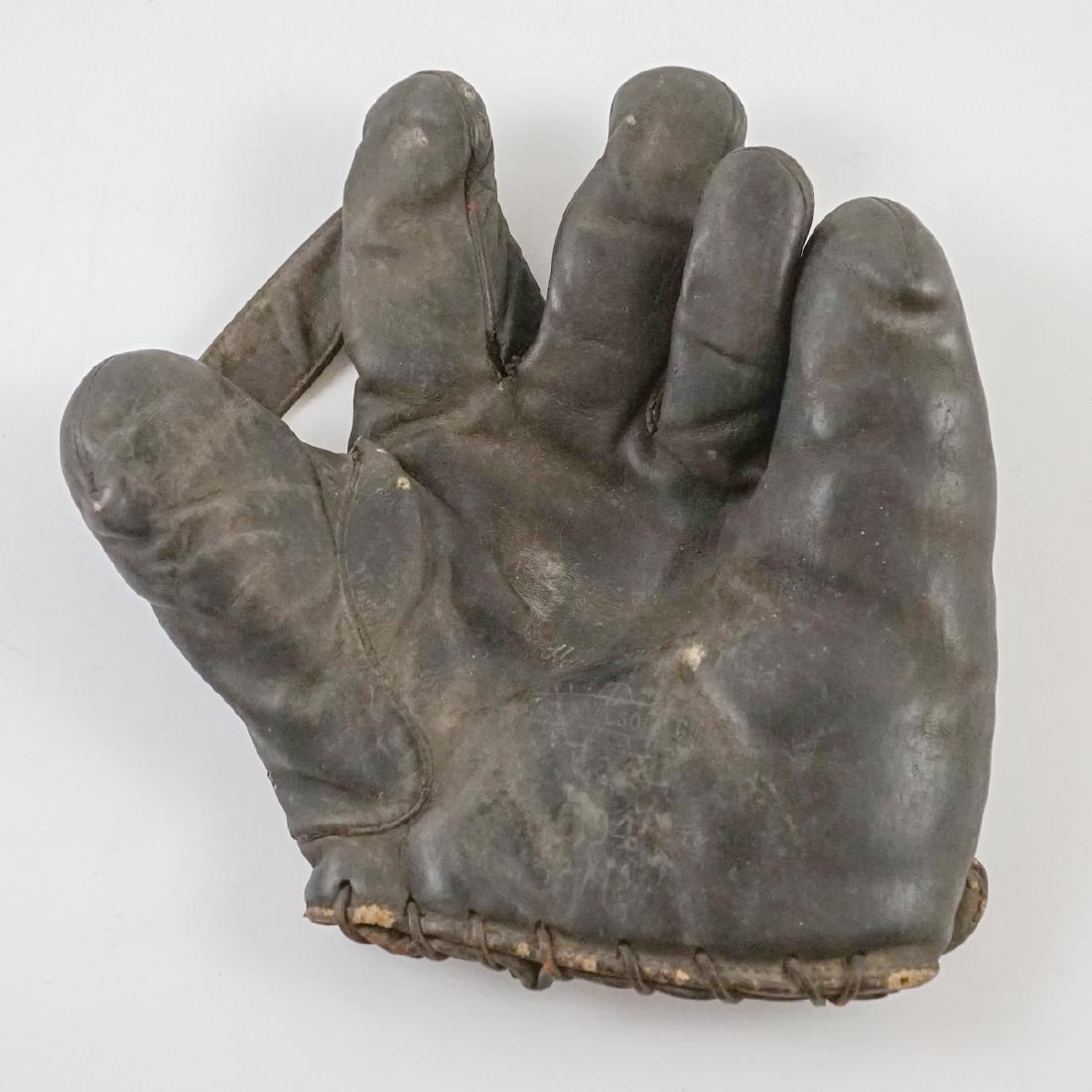 Harry Heilman Store Model Wilson Baseball Glove: Harry Heilman Store Model Wilson Baseball Glove. Heilman facsimile signature in pocket. Measures 9.5" x 9.25". 1" web, web is separated on left side. Overall good. We ship most items from this auction