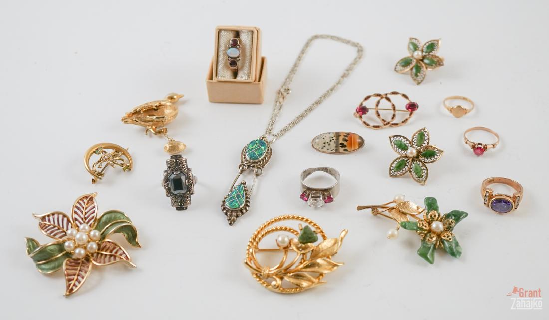 Estate Jewelry Group of Gold, Silver & Costume: An estate jewelry lot including a 14k gold seed pearl pin, Gilson Opal pendant, Moss Agate pin, sterling rings and costume jewelry. We ship most items from this auction in house and gladly combine shi