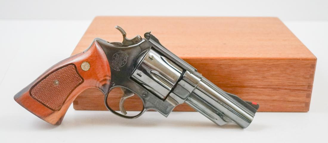 Smith & Wesson .44 Magnum with Box Model 29-2: Smith & Wesson .44 Magnum Model 29-2 with original box. Light actual use if any. Residue from the breakdown of the fitted box liners needs to be cleaned from gun. Serial number N60280. Pictures 3-4 re