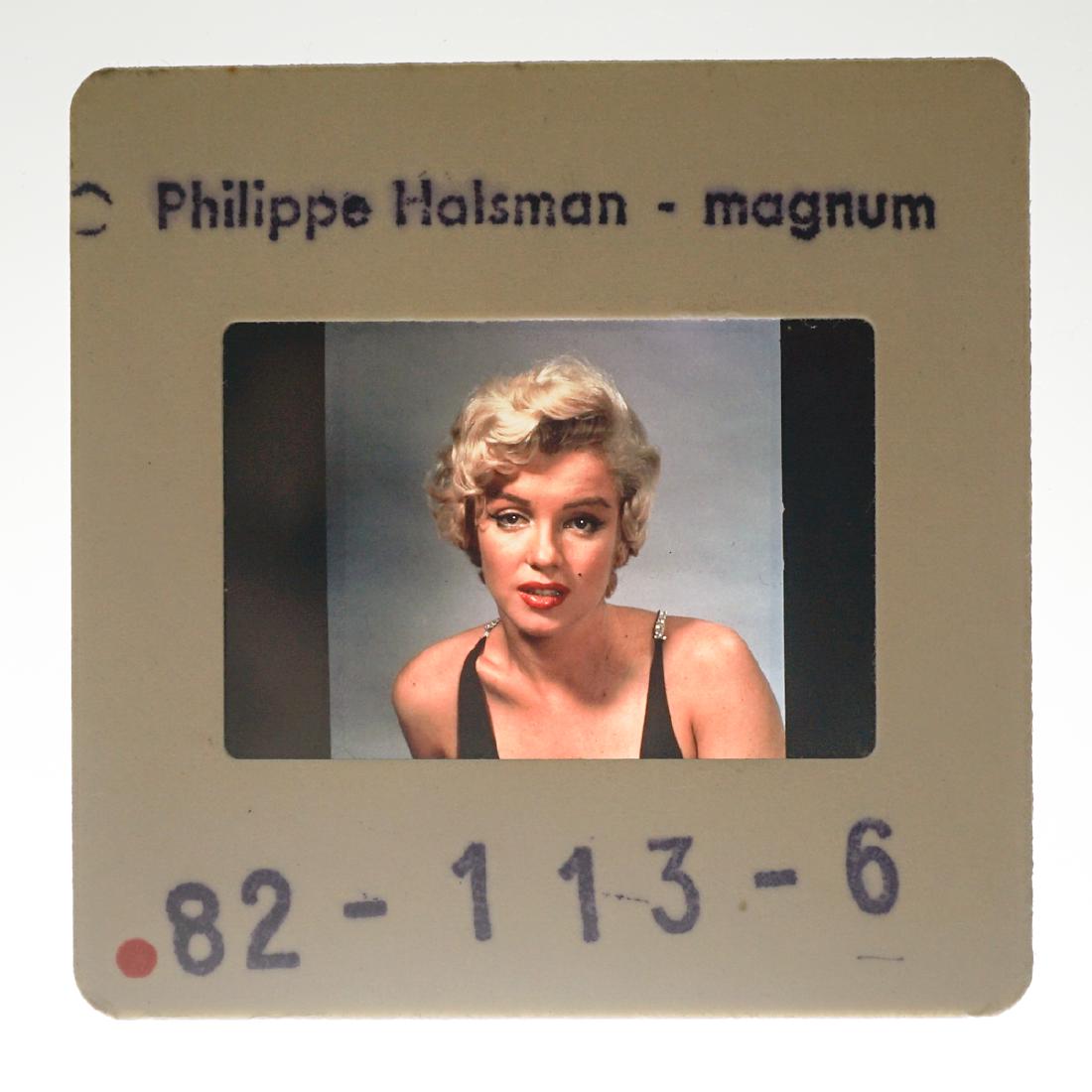 Philippe Halsman Slide of Marilyn Monroe: Philippe Halsman slide of Marilyn Monroe. Provenance: Seattle, Washington estate. We ship most items from this auction in house at the fairest possible prices.