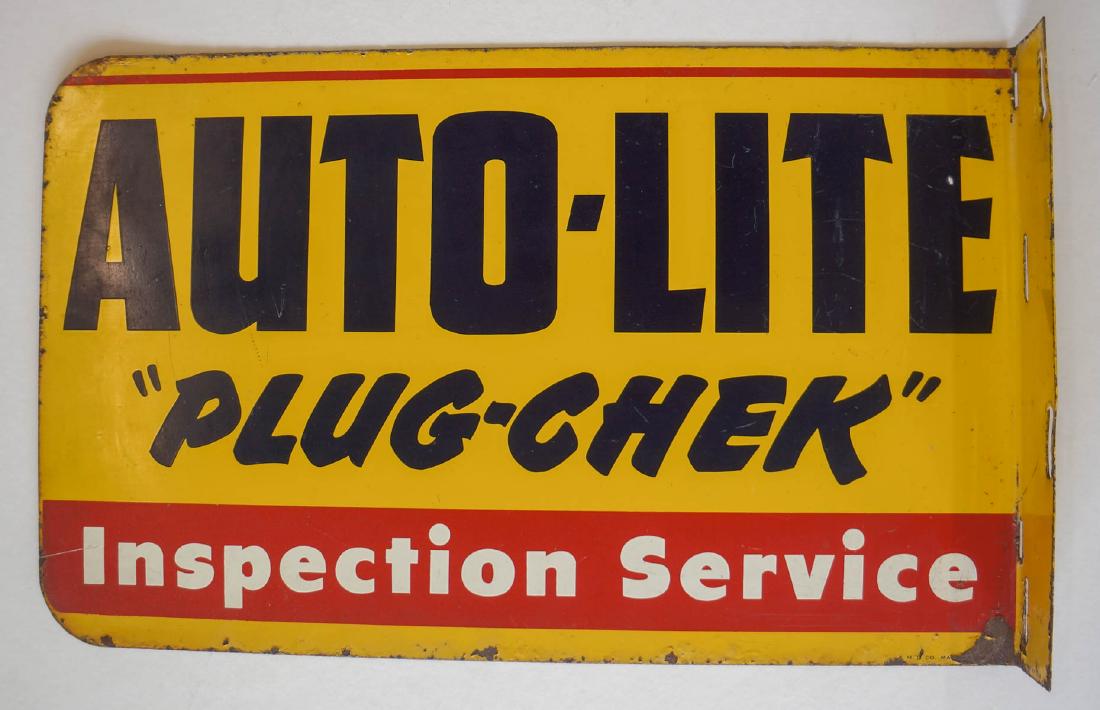 Auto-Lite Spark Plugs Vintage Flange Sign: Auto-Lite Spark Plugs vintage double-sided metal flange sign. Measures 11.75" x 19" x 2.25". Provenance: Estate of Jerry McAuliffe, Seabeck, Washington. We ship most items in-house at the fairest poss